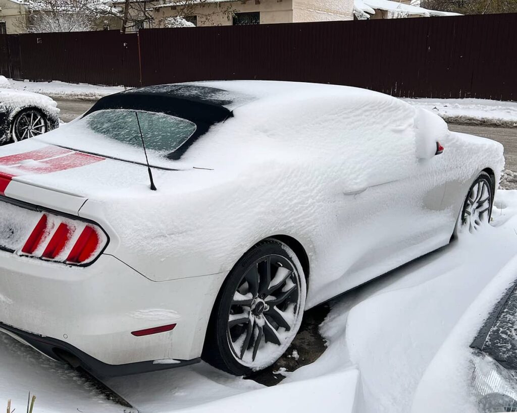 Convertible Ford Mustang in snow