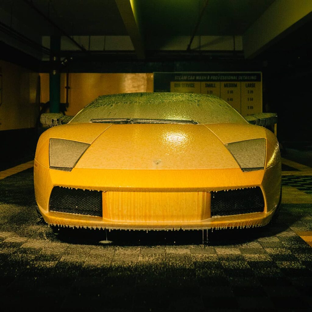 Lamborghini Murcielago roadster at the car wash covered in soapy water