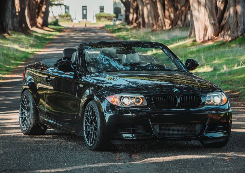 Black BMW 1-series soft top convertible